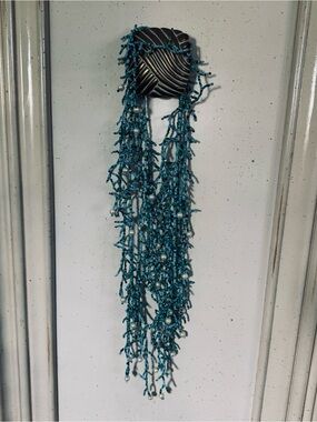 Beaded Teal Multi-Strand Statement Necklace coral looking with pearls.